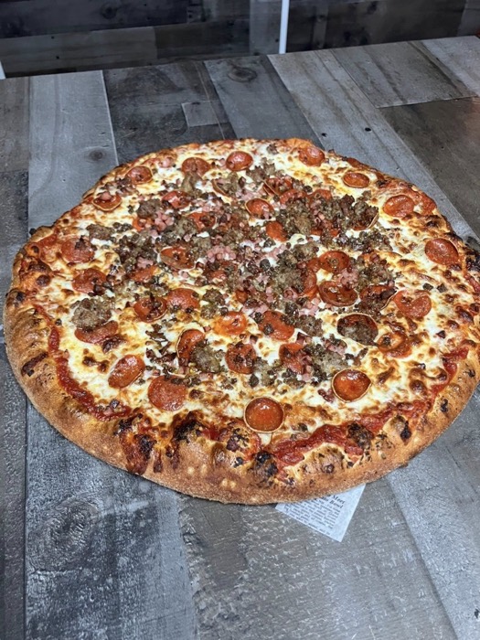 Meat lovers supreme pizza